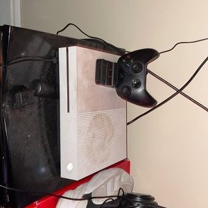 Comes with 2 controllers a couple of games and a headset